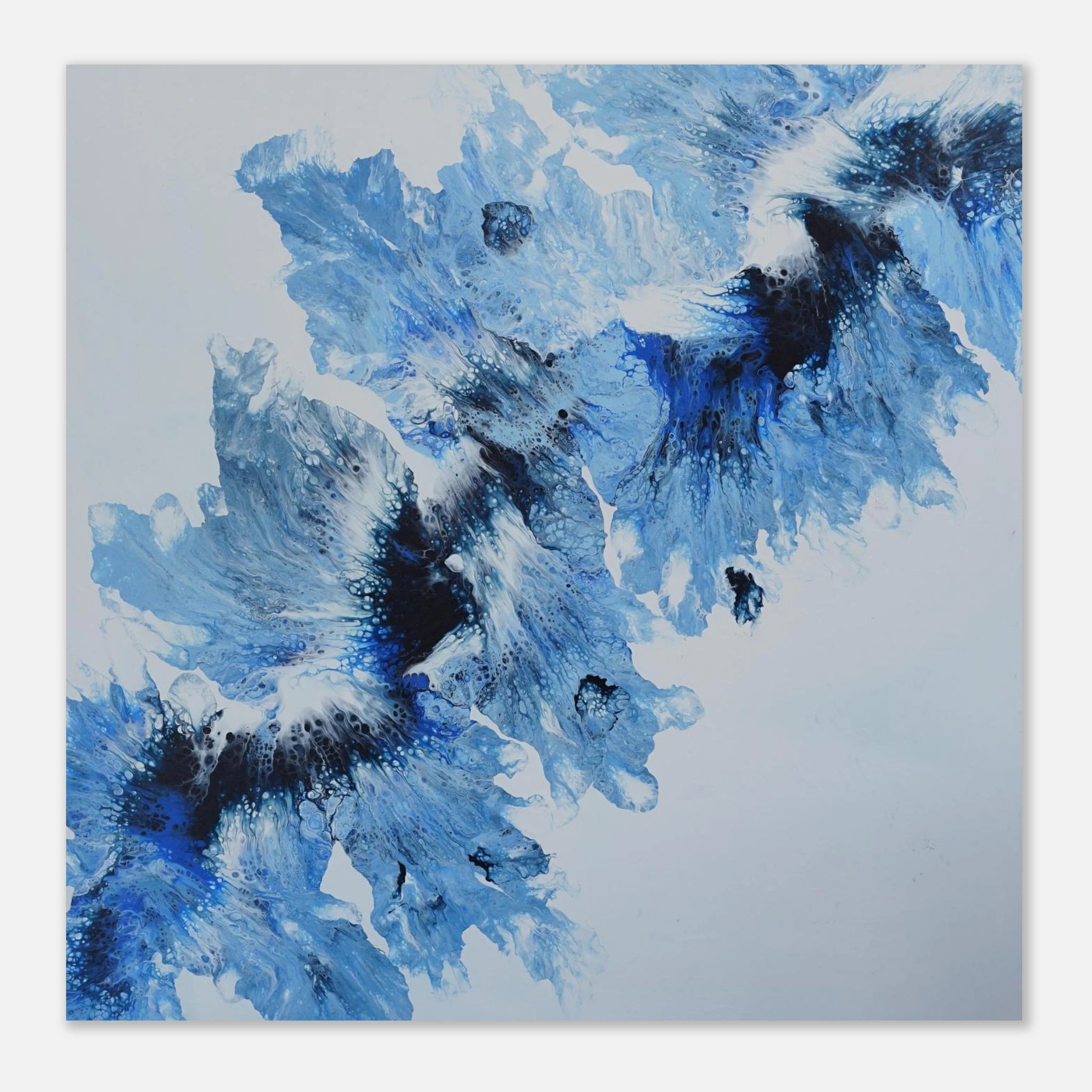 Abstract blue and black painting on a white canvas 